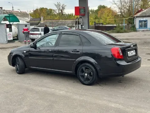 Продам chevrolet лачетти 2012 год 1.4 двигатель состояние как на фото ухоженный автомобиль я собстве... - фотография