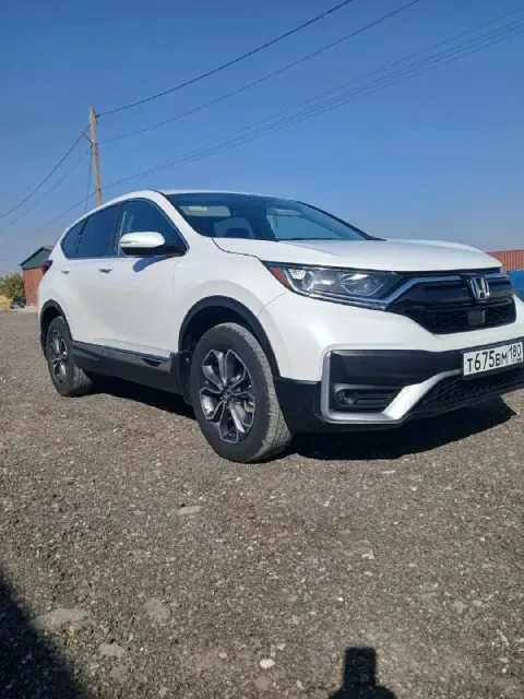 Продам honda crv 2020г пробег 65т км состояние отличное белый жемчуг полная комплектация полный прив... - фотография