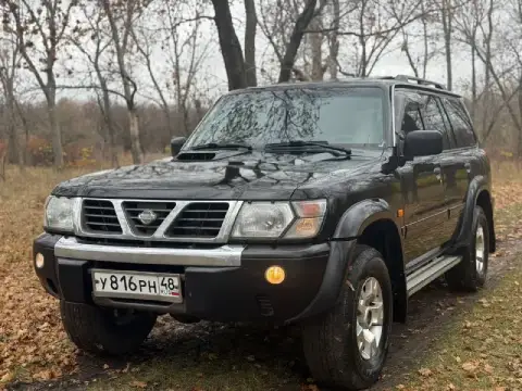 Продам легендарный nissan patrol в кузове y61. Рамный, семи местный внедорожник. В боевом состоянии,... - фотография