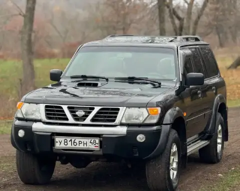 Продам легендарный nissan patrol в кузове y61. Рамный, семи местный внедорожник в боевом состоянии. ... - фотография