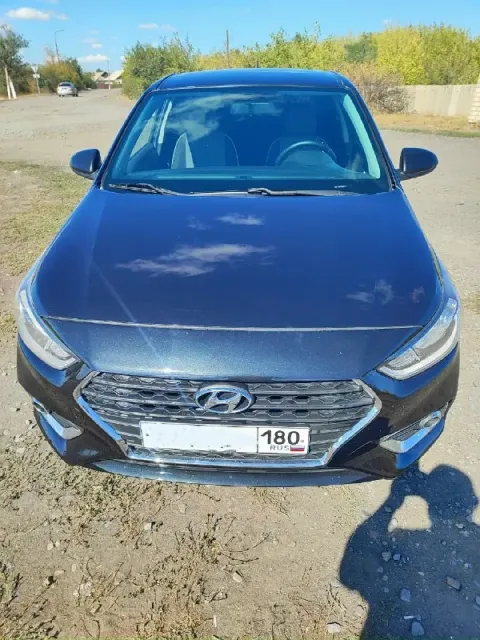 Продам hyundai solaris с объёмом 1.6, 2018 года. с оригинальным пробегом 118 тыс зелёная автотека. д... - фотография
