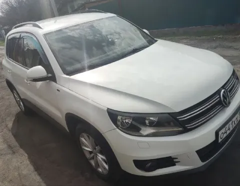 Продам volkswagen tiguan 2016 года. 1.4(122л. с) 6 мкпп. пробег 185 к. км. цена 1.490🍋₽ автомобиль п... - фотография