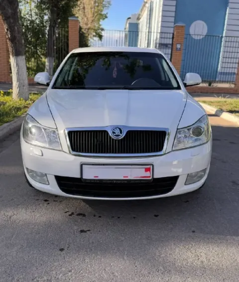 Продам scoda octavia а5 1.8 tsi год 2012 пробег 201 000 акпп aisin авто в максимальной комплектация.... - фотография