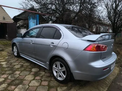 Mitsubishi lancer 10 2008г. Мотор 2.0.газ пропан вписан. Пробег 138.000т. Автомобиль находиться в г.... - фотография
