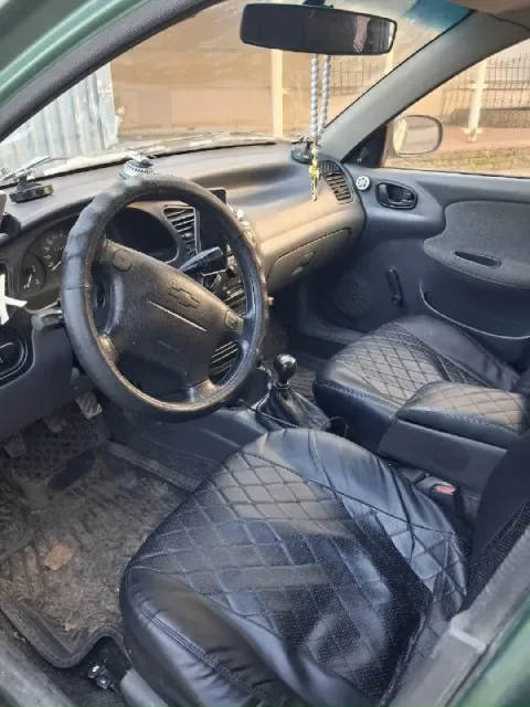 Продам горловка срочно. Chevrolet ланос 2006г 1.5мотор. 15 диски резина зима, газ пропан двигатель к... - фотография