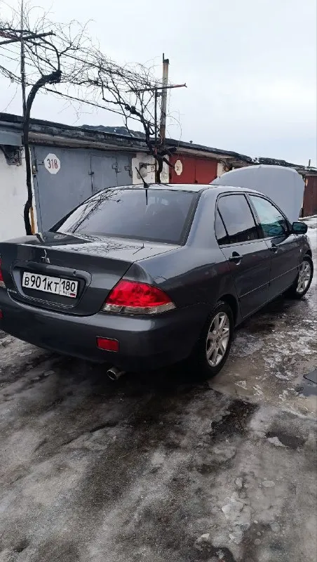 Продам автомобиль лансер девять в хорошем состоянии в машину  вкладывать вообще ничего не надо сел и... - фотография