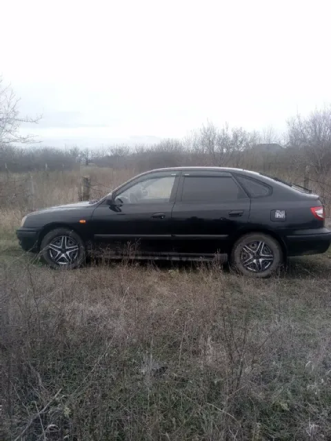 Продам hyundai элантра xd 2004г 1.6 /16v гур, кондей(работает исправно) 4 эсп, музыка, очень простор... - фотография