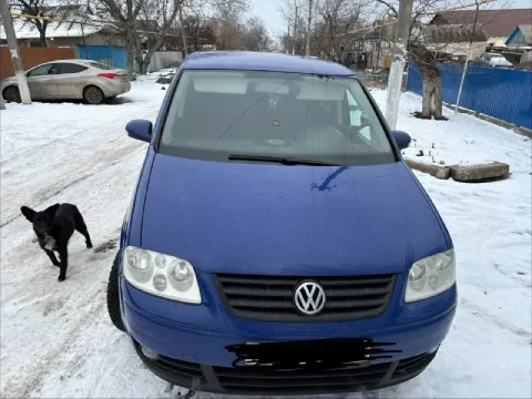 Продам volkswagen туран 2004г. в.,1,6 mpi, на механике, 7 мест, пробег 340000 км. , новый аккумулято... - фотография