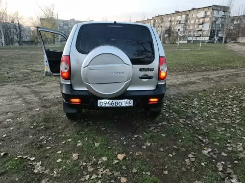 Chevrolet нива, 2011 год, 124к пробег, кондиционер, чехлы экокожа. Кпп, мосты, раздатка, двигатель о... - фотография