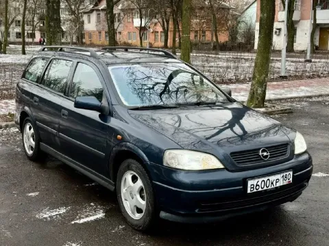 Продам опель астра в универсале, караван. мотор 16v масло не ест, не дымит, не троит. пробег 203000... - фотография
