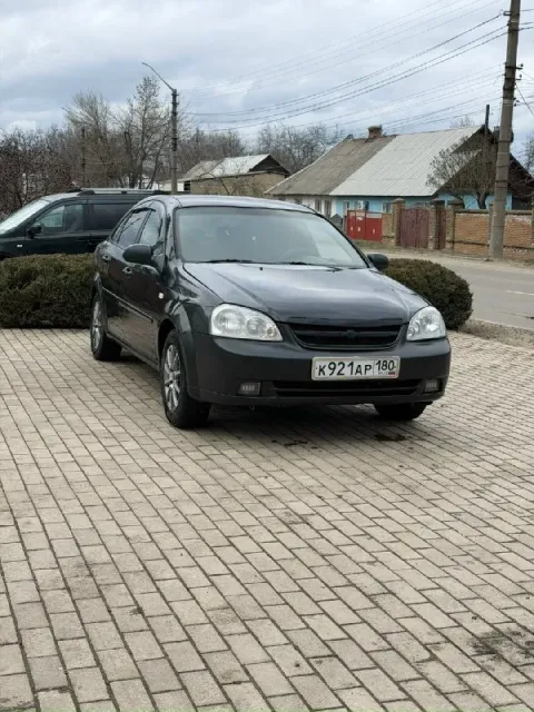 Продам chevrolet лачети chevrolet lacetti 2008 1.4 газ/бензин, сел поехал с документами порядок г. Х... - фотография