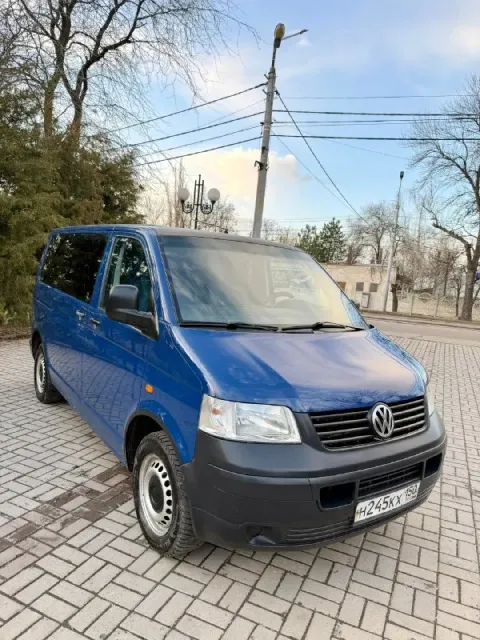 Продам volkswagen t5 1.9 tdi 2007 год 1 владелец за всю жизнь, пассажир 7+1 мест по кузову авто в оч... - фотография