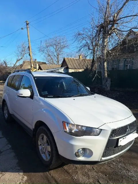 Mitsubishi outlander xl 2012 год двигатель 2.0л (150л. с. ) коробка cvt(вариатор) подключаемый полны... - фотография
