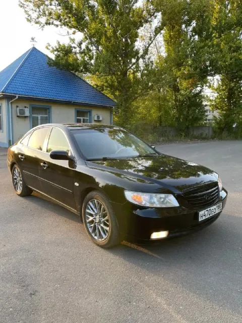 Продам корейский бизнес класс hyundai grandeur tg 2007 год, черный на черном. двигатель 3.3 атмосфер... - фотография