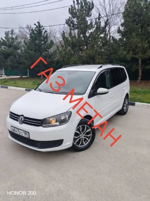 Продам volkswagen touran ecoful 2011год пробег 262тыс. км поменянна цепь грм, турбина, сцепление всё... - фотография