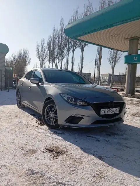 Мазда3, мотор1.6, автомат, состояние огонь, двух зонный климат, подогрев сидений, современный планше... - фотография