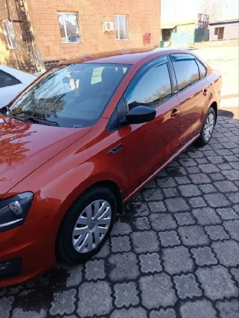 Автор: продам автомобиль volkswagen polo 2017 года, в кузове оранжевого цвета, двигатель 1.6 коробка... - фотография