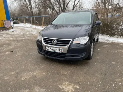 Предлагаю вашему вниманию volkswagen touran черного цвета, 2007 года выпуска. автомобиль в отличном... - фотография