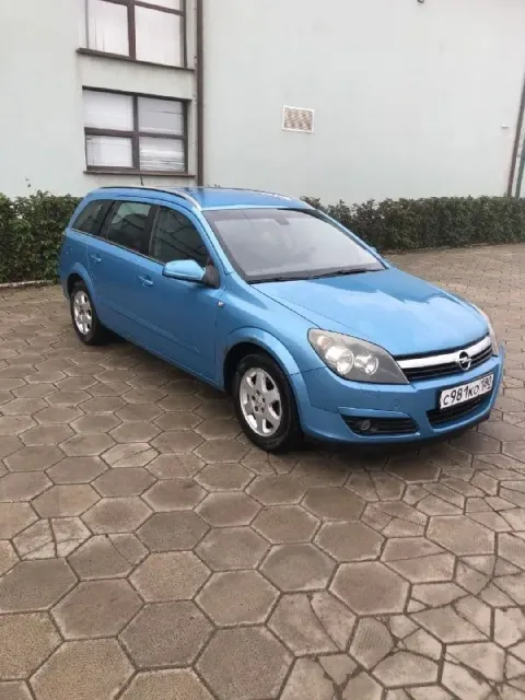 Продам опель астра 1.8 2005 г. кузов универсал пробег - 291 тыс по птс 1й владелец двигатель без нар... - фотография