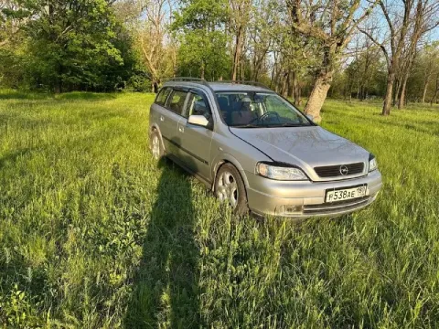 Opel astra g 2003г бензин-газ ( метан) cng заводской бробег: 210 000 км. стоит - датчик дождя - круи... - фотография
