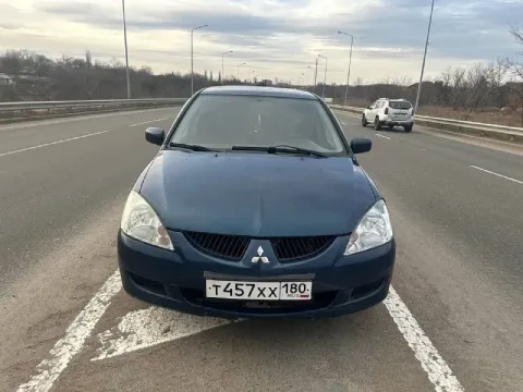 Продам mitsubishi lancer 9 мотор 1.6 коробка автомат побег 230.000 тысяч машина на полном уверенном ... - фотография
