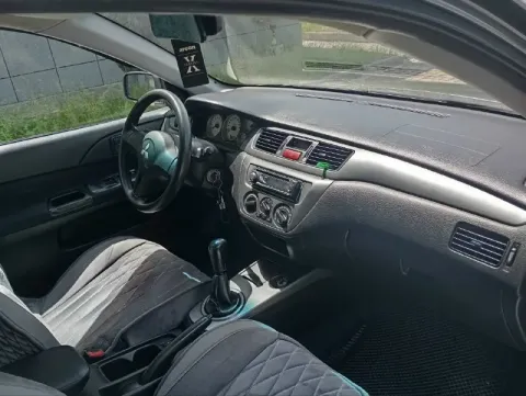 Продам mitsubishi лансер 9 объём двигателя 1,6 механика, 2006 год выпуска, состояние хорошее комплек... - фотография