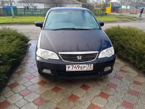 Продам honda одиссей 2,3 газ минивен 3 ряда сидений резина зима лето. Расход газа12 на сто. Км запас... - фотография