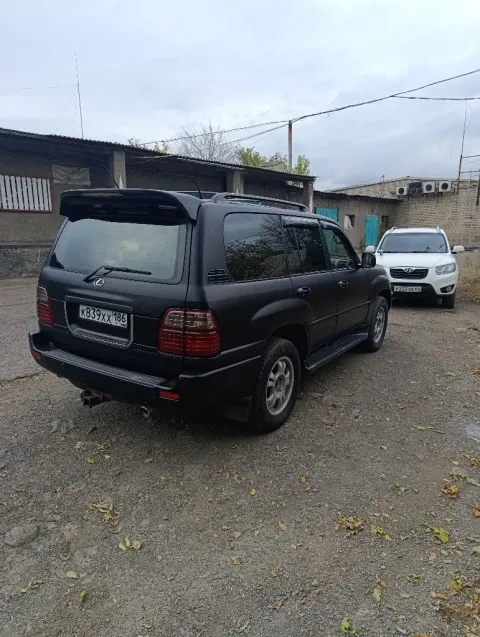Лексус lx470 2000 гв. Хорошее состояние, езжу каждый день, авто в пленке так покупал, пробег 440000 ... - фотография