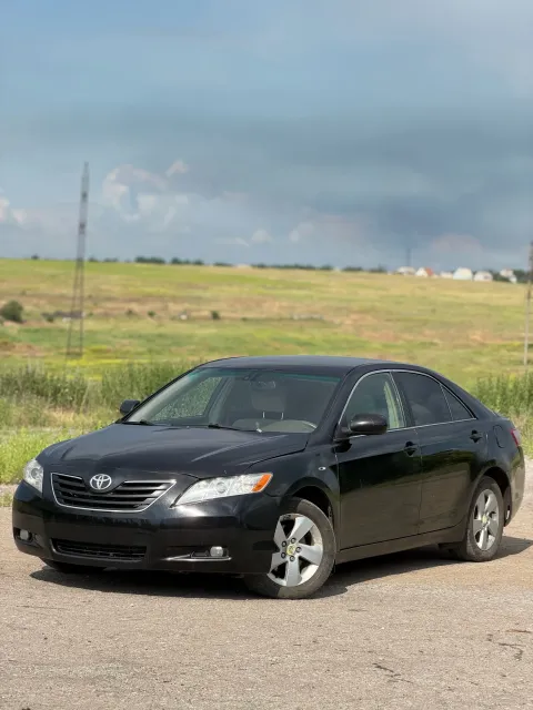 Харцызск toyota camry xv40 2006 г. 2.4 мт двигатель работает ровно, не дымит и не троит. коробка так... - фотография