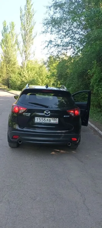 Продам мазда сх5 2014г 2.5литра полный привод пробег 157000км. Цена 1.8 милиона рублей. Торг. Тел9494074389.салон кожа люк. Датчик дождя света слипых зон. Два камлекта ключей ковриков. Калёса зима лето всё работает всёобслужено - фотография - 7