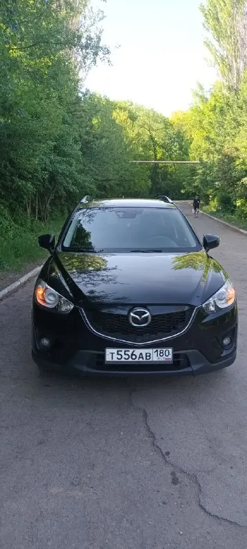 Продам мазда сх5 2014г 2.5литра полный привод пробег 157000км. Цена 1.8 милиона рублей. Торг. Тел9494074389.салон кожа люк. Датчик дождя света слипых зон. Два камлекта ключей ковриков. Калёса зима лето всё работает всёобслужено - фотография - 8