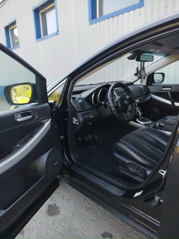 Продам машину в хорошем состоянии. Mazda cx7 2008 год 2.3 turbo мотор в отличном состоянии полностью обслужен новые цепи фазорегулятор башмаки натяжители сальники коленвала все запчасти по мотору которые ставил оригинал, все расходники менялись вовремя по мотору не единой капли масла акпп работает исправно раздатка работает исправно авто полный привод по электрике все работает как положено фары отполированы и защищены в броне плёнке капот тоже поклеен пленкой кованый карбон смотрится очень круто по ходовой части все отлично колеса r19 зимние шины одам в подарок авто лично мое не перекуп более подробно за информацией звонить по номеру 👇 +79493795882 дмитрий цена 💸 за машину 1.1 🍋 хорошим людям торг.
📞 Звоните: +7(949)3795882 - фотография - 6