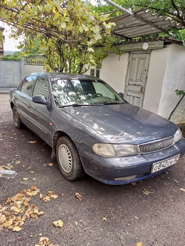 Продам киа кларус 2.0 1997г. , полностью на ходу. Заниматься нужно только по кузову. Лобаш под замену. Отдам 2 новых зимних ската, и новое стекло. Собственник. Доки чистые. Продажа по дкп. 100 000 р. Без торга. Г. Мариуполь. +79493307026(телега, ватсап). - фотография - 1