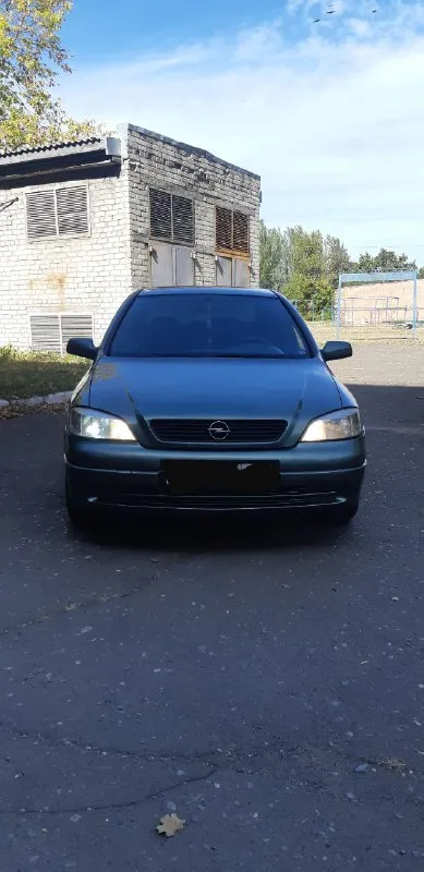 Продаётся opel astra g 2001 год 1.4. 90. Лошадей мотор работает как часы тихо  не дымит не троит масло не расходует коробка отлично ходовая часть мячик автомобиль в отличном состоянии за машину не стыдно кондиционер работает холодит очень хорошо подогрев зеркал подогрев заднего стекла вся электрика всё что должно работать всё работает как говорится сел и поехал.   Цена 385 т. Р. Вопросы по телефону +79495823678 - фотография - 1