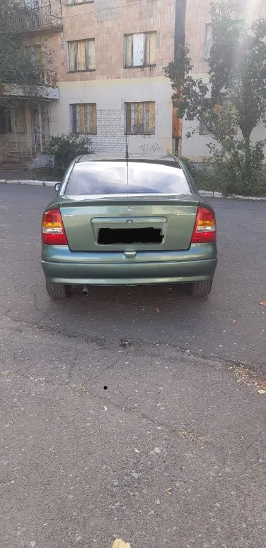 Продаётся opel astra g 2001 год 1.4. 90. Лошадей мотор работает как часы тихо  не дымит не троит масло не расходует коробка отлично ходовая часть мячик автомобиль в отличном состоянии за машину не стыдно кондиционер работает холодит очень хорошо подогрев зеркал подогрев заднего стекла вся электрика всё что должно работать всё работает как говорится сел и поехал.   Цена 385 т. Р. Вопросы по телефону +79495823678 - фотография - 5