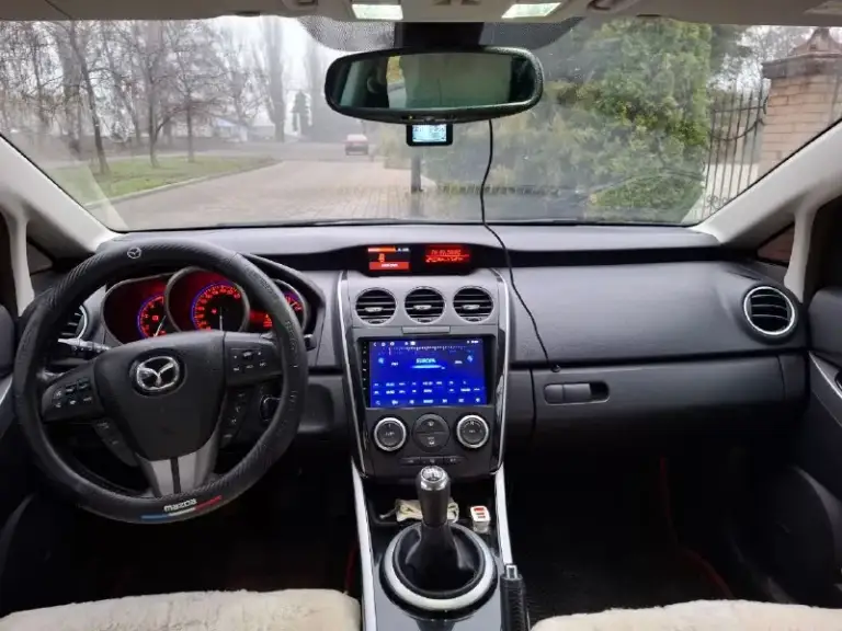 Продам mazda cx-7 2.2 дизель-механика-полный привод, 2011 год, пробег 174 тыс. Км. Первый собственник на российском учете. Во владении с ноября 2021 года. Была ввезена из германии. Автомобиль семейный, удобный, стильный. Такая же конфигурация двигателя ставилась и на mazda 6 gh. Двигатель и мкпп (6 ст) работают без нареканий (двигатель был заменен на контрактный, особая отметка в документах есть). «экология» отшита программно. Двигатель очень тяговитый и достаточно экономичный для такого размера автомобиля. По комфорту: кожаный салон, электрорегулировка сидений с памятью положения водительского сиденья, подогрев передних сидений, климат контроль, камера заднего вида, мультируль, бортовой компьютер, круиз-контроль, бесключевой доступ, 2 шт ключ-брелок. Салон чистый, ухоженный, без повреждений. В общем очень хороший, вместительный семейный автомобиль. С автомобилем идут 2 комплекта колес - r18 - зима, r19 - лето (диски оригинал). Стоимость: 1 100 000 руб (торг при встрече). Осмотр - макеевка. +79495851012 - фотография - 6
