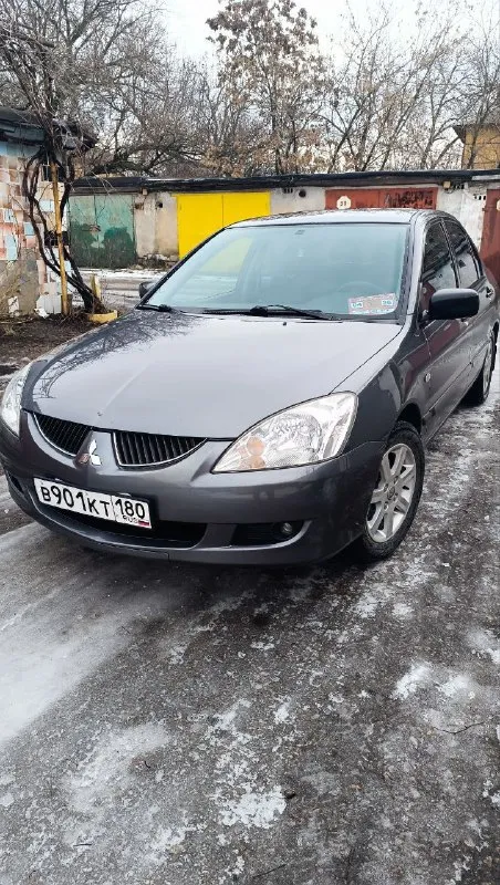 Продам автомобиль лансер девять в хорошем состоянии в машину  вкладывать вообще ничего не надо сел и поехал, на интересующие воросы звоните спрашивайте. Передняя полусфера стекол тонирована атермальной пленкой (по госту проходит) задняя итальянской с фиолетовым оттенком все расходники заменены полная информация что когда менялось на каком пробеге сохранена, так-же с машиной отдам стекла передних дверей затонированных в такую же плёнку как задняя часть автомобиля, стекла были поменены для перигистрация автомобиля  на российские номера. 2 ключа оригинальных,
2 Брелка в сигнализации с дисплеем. 79494749155
Прошу 750000руб. - фотография - 2