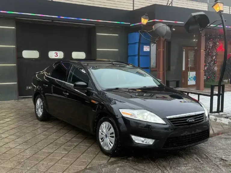 Продам ford mondeo 4 2007 год 2.0л авто в идеальном состоянии двигатель коробка ходовая в отличном самая полная комплектация линзованные фары электропривод сидений датчик дождя/ света климат контроль тесло монитор круиз контроль кнопка старт стоп и многое другое два комплекта колес лето на литых дисках машина на мне на учёте собственник! Карта техосмотра имеется!!! Цена 670тыс руб срочно‼ торг +79490738124 харцызск - фотография - 2