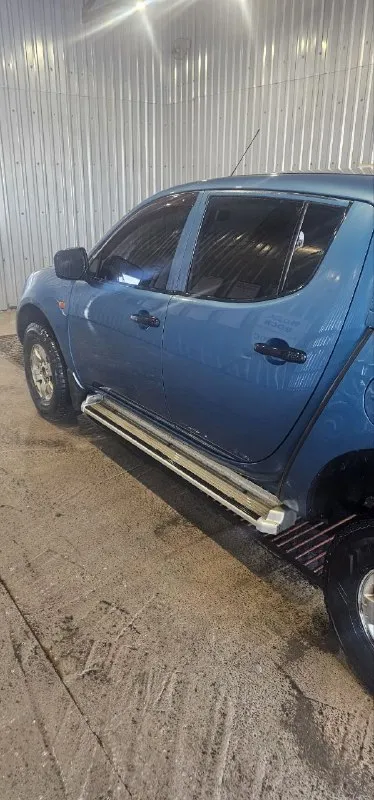 Здравствуйте продаётся машина mitsubishi l 200, 2008 года.   2,5 дизель. Машина в хорошем состояние. Ходовая перебраная полностью, заменены рессоры, заменены ремни грм полностью, стоят новые задние амортизаторы, в дтп не было, работает идеально, сигнализация с автозапускам, турбина работает отлично раздатка так же идеально, кондиционер дует отлично, за машиной ухаживали. Отдам с хорошей зимней резиной на дисках. С документами все хорошо 180 регион. Цена 1 🍋+79494879715. - фотография - 4
