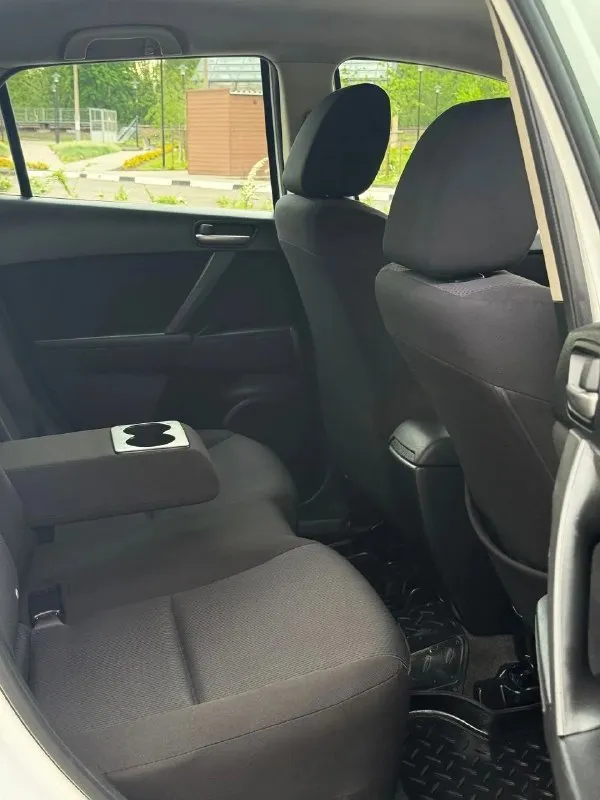 В продаже mazda 3, 2010 г. В, 1.6 л, 105 л. С, мкпп. Один собственник все 16 лет, одна запись в птс.

Кузов без следов коррозии, соответствует фото.

Комплектация - двухзонный климат с круизом, датчик дождя / света, мультируль, складывание зеркал, подогревы сидений, зеркал и лобового, штатный парктроник, омыватель оптики, линзы, датчики ebd, bas, abs, esp и прочие навороты. Стоит автозапуск, два родных ключа и т. Д и т. П.

Техосмотр пройден, авто готово к оформлению. Цена - 750,000 рублей. Рассрочки и обмена нет. Территориально находится в г макеевка (центр) контакты : +7(949)003-33-27, +7(979)028-27-27 - фотография - 9