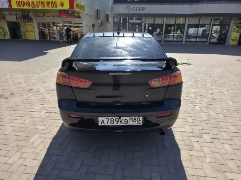 Продам mitsubishi lancer x
2008 Год, 1.8, акпп
Пробег 211 000.

Юридически чистая. Переоформление без проблем.

По технике порядок. Мотор порядок, коробка порядок. Все кнопки работают.

Комплектация: мультируль, круиз, автосвет, датчики дождя, усилитель руля, электрорегулировка зеркал, все 4 стеклоподъёмника.
В машине много чего сделано, т. К. Делал для себя, денег не жалел.
Стоит хорошая андроид магнитола с andoid auto и carplay.
Стоит дорогая, хорошая музыка. Новые динамики, сабвуфер от sony в багажнике, новый усилок.  
Установлен регистратор, камера заднего вида.
Стоит проекция на лобовое.
Климат работает (холодит и греет как надо).
Салон красивый, опрятный. Новые дорогие чехлы кожа+алькантара. Качественно перешит руль.
Сигнализация starline с автозапуском. Работает как часы.
Подушки на месте. Abs, esp.
2 Комплекта колёс. +запаска целая. Лето на дисках, зима штампы. Резина год назад бралась новая.

Сделана шумоизоляция капота, переднего правого подкрылка. (на второй подкрылок не успел поставить, времени не хватило. Весь комплект шумки в 3 слоя и инструменты для него отдам.
С машиной ещё много всего в довесок прилагается. От мелочей до разнообразных запчастей.

По кузову есть возрастные косяки. На фото все видно.

Цена: 650.000 р.
Продажа срочная, хороший торг у капота.

Осмотр днр, г. Донецк.
Подробности по телефону:
Роман
Феникс: +7-949-699-48-13
Мтс: +7-985-007-41-97 
Телеграм: @pyke666 / +79850074197 - фотография - 4