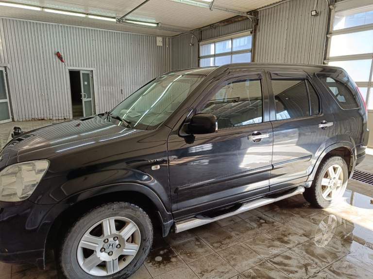 Продам хонда срв2 2006г.2л, автомат, пробег 277тыс. 4×4.владею с 2013года. Комплектация полная (кожаный салон, мультируль, подогрев передних сидений и зеркал, климат контроль однозоный, свет ксенон, шумоизоляция салона и багажника, мультимедиа андроид 2/32 с навигацией, сигнализация с автозапуском) корпус без проблем, ходовая в порядке. Стоимость 1250000₽. Тел:+79494192805 - фотография - 3