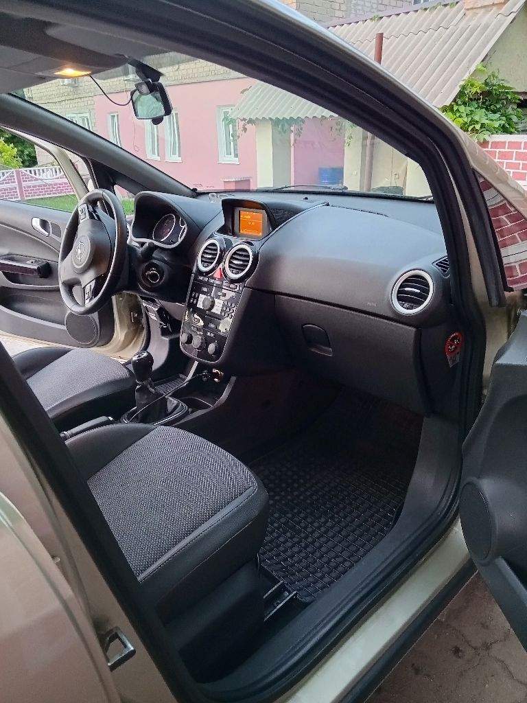 Продам opel corsa d.2006 года. Двс 1,2.коробка механика 5.кондиционер, климат, подогрев передних сидений,6-сть подушек безопасности, электропривод боковых зеркал. Пробег 240 000 км. Цена 360 000р. Торг! - фотография - 4