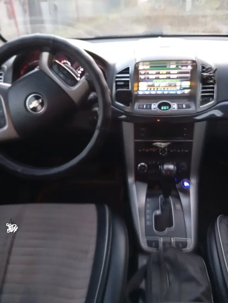 Продам кроссовер chevrolet captiva 2014 г. В. Машина в заводском окрасе. 5 мест. 2.4 бензин, я второй владелец, показания одометра 146 т. Км. Классический автомат , подключаемый полный привод. 2 ключа, 2 комплекта резины. Работает абсолютно все. Подогревы всех сидений ( перед, зад. ) полный электро пакет. Цена 1,450 р. +7949 348 04 77 на этом номере макс. Торг при осмотре. Бонусом \полный бак бензина\. Есть еще хендай санта фе 2010 г. В. 2.2 дизель пробег 202 т. Км. - фотография - 6