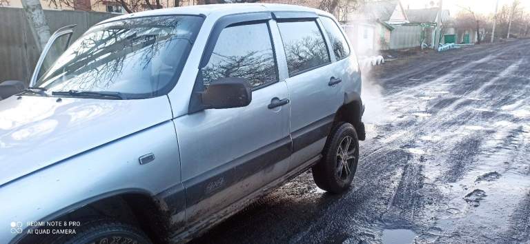 Продам нива chevrolet 2004 г выпуска на полном ходу, сел поехал. Без гнили и рыжиков, пробег 220 т. На местном учете, звоните в любое время. Цена 390тыс. Тел. +79493918856 - фотография - 11