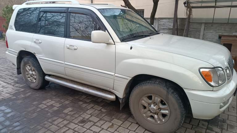 Продам lexus lx 470 2000г. В. Состояние хорошее. Цена 1.7 млн. Пробег 300тыс. Установлен газ. Покупался новым в автосалоне в г. Донецк. Тел. +7949 четыре три четыре 2349. Александр. - фотография - 1