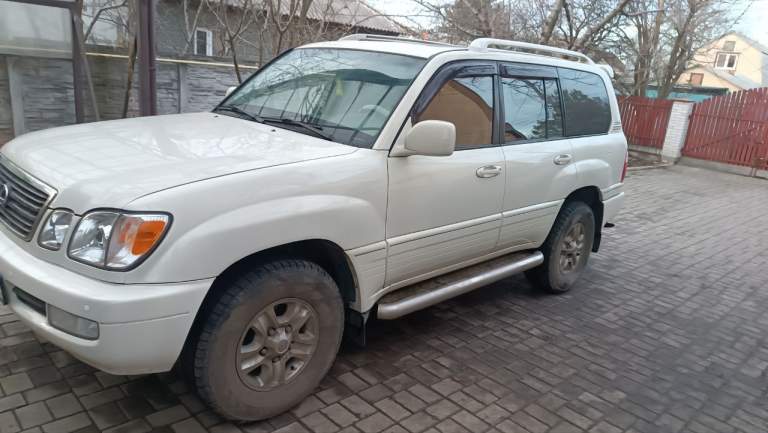 Продам lexus lx 470 2000г. В. Состояние хорошее. Цена 1.7 млн. Пробег 300тыс. Установлен газ. Покупался новым в автосалоне в г. Донецк. Тел. +7949 четыре три четыре 2349. Александр. - фотография - 12