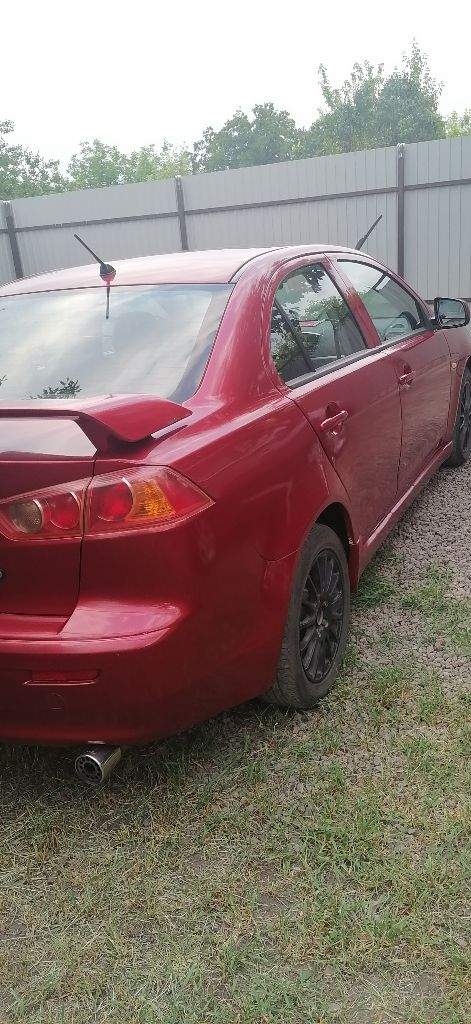Mitsubishi lancer 2.0 mt, 2008 г. В. , 216 298 км. Пробега, полный привод с завода, работает без нареканий. Редкий полноприводный автомобиль. Датчик дождя, света, подогрев передних сидений, штатная магнитола, круиз контроль. Двигатель и коробка в хорошем состоянии, косметички имеются сколы на пластике, (3 года назад автомобиль освежался). Ходовая часть исправна. Цена 650.000 р, . Тел. +7949-422-97-28. - фотография - 3