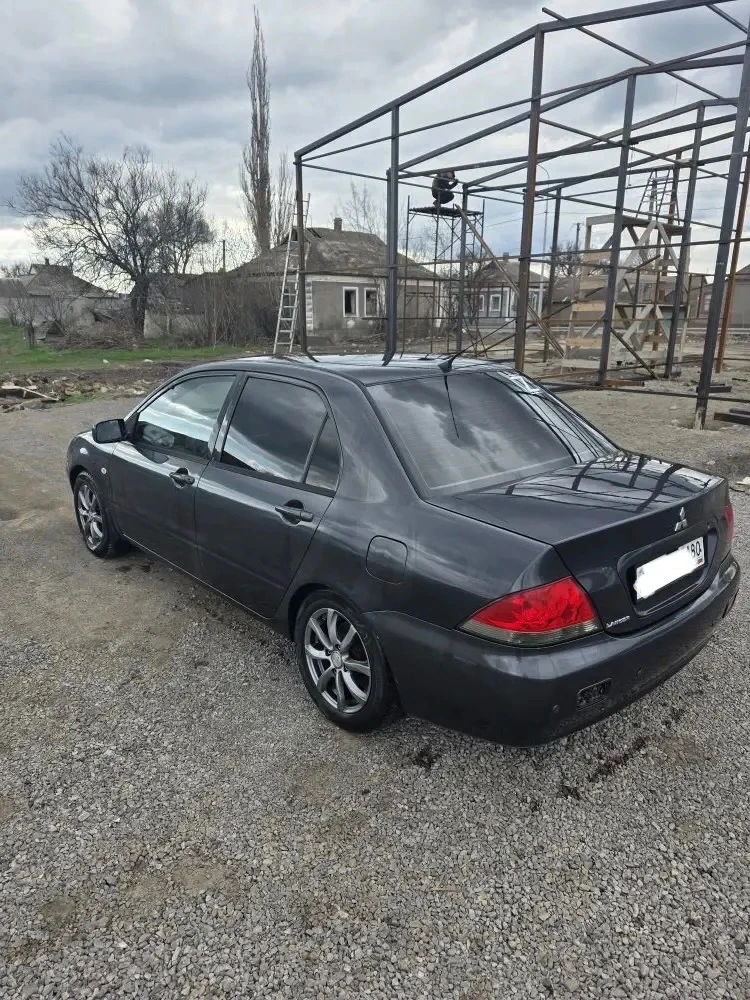 Mitsubishi lancer 9, 2004г — машина на ходу с пробегом 286 000 км. Несмотря на то, что состояние не идеальное (есть следы эксплуатации на кузове и в салоне), необходима диагностика и ремонт ходовой.

Автомобиль полностью функционален и готов к использованию.

*Капитальный ремонт мотора выполнен 50 000 км назад, работает стабильно

Все основные агрегаты работают исправно, заводится в любую погоду. Документы чистые.
Звоните чтобы договориться о просмотре.

250 000Р
Торг

+79490977807 - фотография - 3
