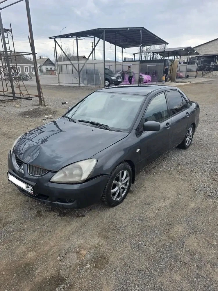 Mitsubishi lancer 9, 2004г — машина на ходу с пробегом 286 000 км. Несмотря на то, что состояние не идеальное (есть следы эксплуатации на кузове и в салоне), необходима диагностика и ремонт ходовой.

Автомобиль полностью функционален и готов к использованию.

*Капитальный ремонт мотора выполнен 50 000 км назад, работает стабильно

Все основные агрегаты работают исправно, заводится в любую погоду. Документы чистые.
Звоните чтобы договориться о просмотре.

250 000Р
Торг

+79490977807 - фотография - 2